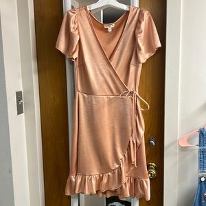 A rose gold dress, in a size Large.